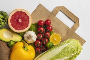 flat lay assortment vegetables with paper bag scaled