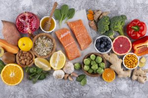 top view immunity boosting foods with vegetables fish scaled